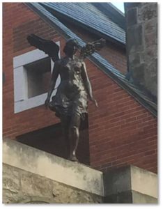 One might think the Church Court angel was a sacred object that survived the fire and was repurposed as a decoration for the condominiums. In fact, however, Mr. Gund commissioned the statue and placed her on the courtyard wall along Massachusetts Avenue. Sculpted by Gene Cauthen, the angel stands five feet, six inches high.