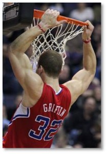 Blake Griffin, basketball player hanging on the basket