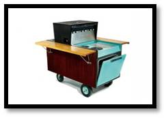 They called it the Partio cart. It had a range, oven, rotisserie and charcoal BBQ and sold for $800 in 1960.  Deluxe models included an umbrella.   Refurbished ones sell for as much as $10,000 today.  It’s a party on wheels.