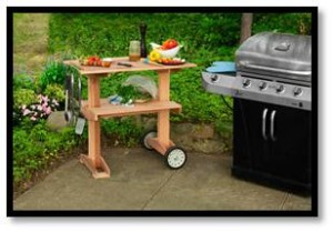 I move the kitchen outdoors.  Nothing fancy—just a grill with a table and chairs—but a much different (and easier) approach to cooking and eating. 