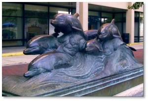 Katherine Lane Weems pursued a distinguished career as an animal sculptor and several of her works adorn the streets and buildings of Boston. In addition to the four rhinos, she sculpted the work called “Dolphins of the Sea:” six dolphins leaping outside the New England Aquarium. Children often climb on it and hug the dolphins. 