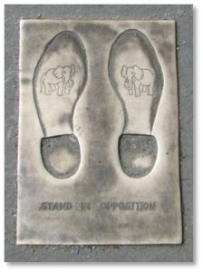 If you are not a Democrat, you can “stand in opposition,” by fitting your shoes into a pair of bronze footprints on the pavement right in front of the donkey. Each one is marked with an elephant, the symbol of the Republican Party that was also popularized by Thomas Nast. 