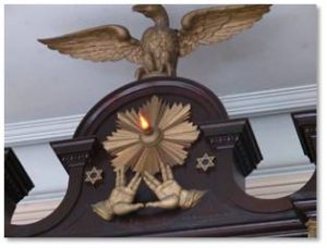 An interesting note is that the Vilna Shul’s Ark of the Covenant is decorated with carved lions, an eagle, a crown, and two hands raised the priestly Kohanim blessing that Star Trek fans recognize as the Vulcan greeting. The late Leonard Nimoy, who played Spock in both the Star Trek television series and the movies, grew up in the West End of Boston not far from Phillips Street. The ark also features carved clam shells, which are not kosher but definitely connect to Boston’s history.