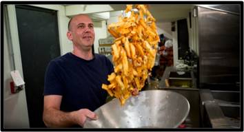 Belgian frites, tossing the frites