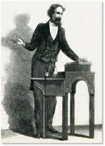 Charles Dickens reading on stage