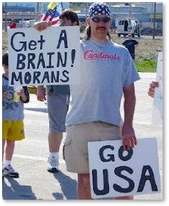 Get a Brain Morans, Go USA, protest sign, white supremacy