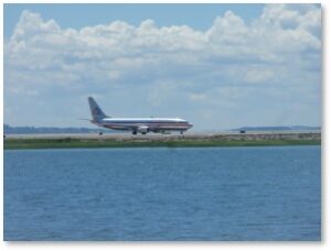 airplane, runway, taxiing, Boston Harbor, Logan Airport