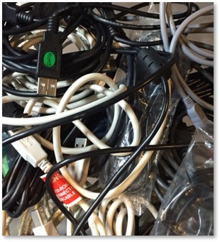 tangled computer cables, connectors, charging, devices